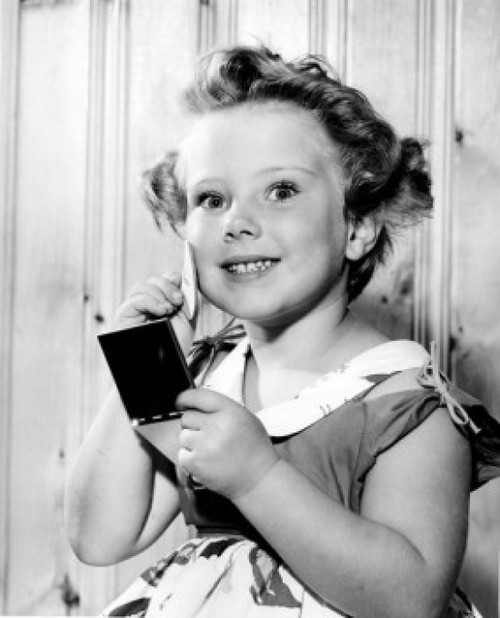 Portrait of girl doing make-up Poster Print - Item # VARSAL255415996