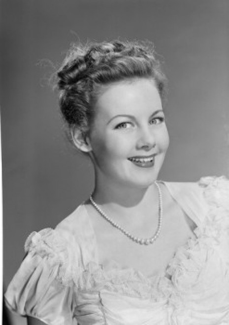 Studio portrait of young woman smiling Poster Print - Item # VARSAL255422978