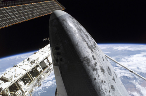 Space Shuttle Discovery docked to the International Space Station Poster Print - Item # VARPSTSTK201776S