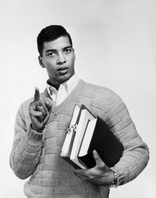 Portrait of a college student holding books and pointing Poster Print - Item # VARSAL25515327B