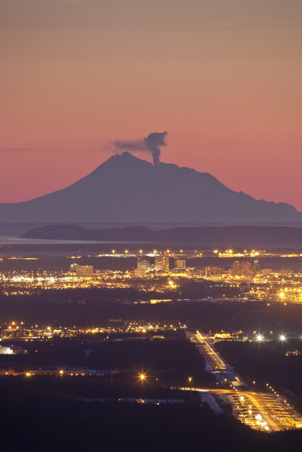 View Of Minor Eruption Of Ash And Steam From Mt. Redoubt With Anchorage, Alaska In The Foreground During Winter PosterPrint - Item # VARDPI2141349