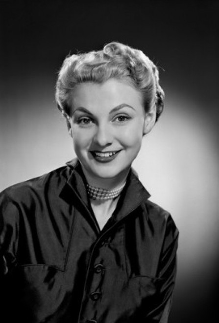 Portrait of young woman smiling  studio shot Poster Print - Item # VARSAL255416928