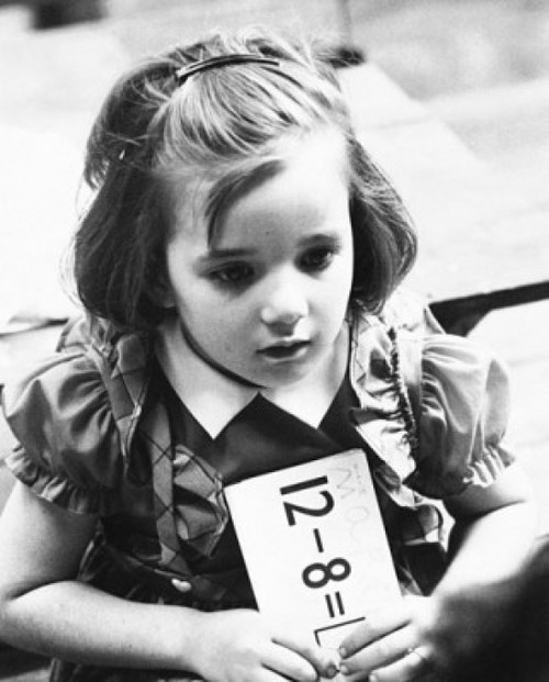 Close-up of a schoolgirl holding a paper Poster Print - Item # VARSAL25517704