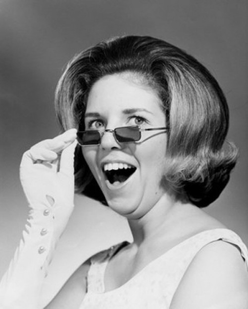 Close-up of a young woman holding sunglasses Poster Print - Item # VARSAL2552799 Close-up of a young woman holding sunglasses Poster Print - Item # VARSAL2552799