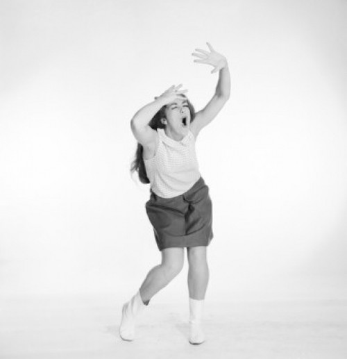 Young woman dancing and singing Poster Print - Item # VARSAL255418583