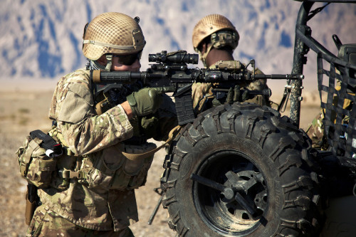 December 13, 2012 - A coalition force member maintains security during a presence patrol in Farah Province, Afghanistan. Poster Print - Item # VARPSTSTK106895M