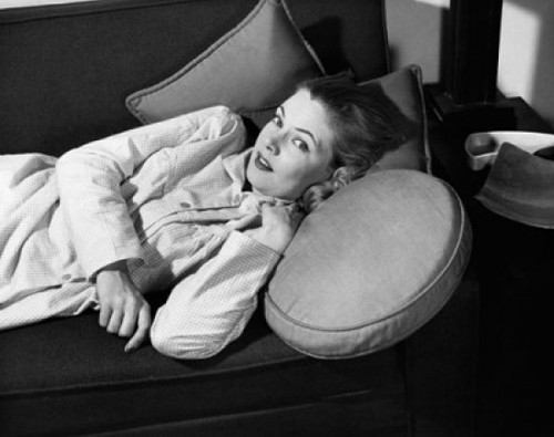 Portrait of a young woman lying on a couch Poster Print - Item # VARSAL25527203