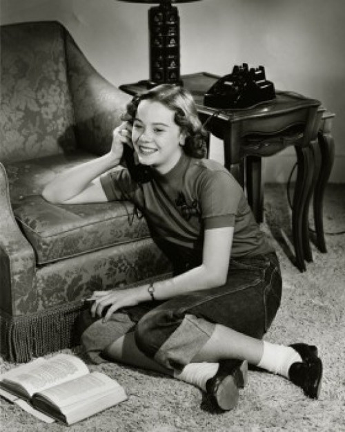 High angle view of a teenage girl talking on the telephone Poster Print - Item # VARSAL2554749B