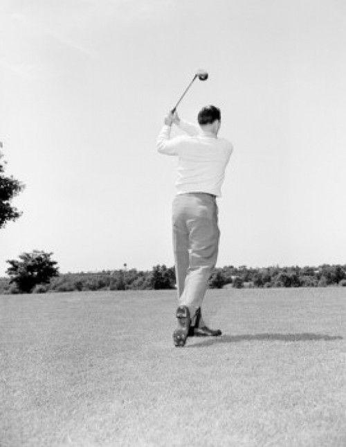 Young man playing golf Poster Print - Item # VARSAL255419219