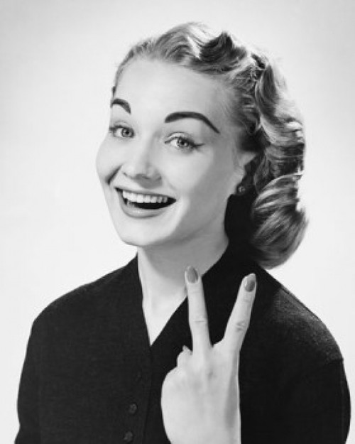 Portrait of a young woman laughing Poster Print - Item # VARSAL25510496