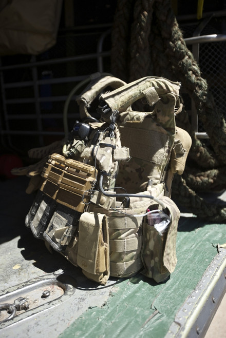 Pararescuemen equipment beside a HH-60G Pave Hawk Poster Print - Item # VARPSTTMO101083M