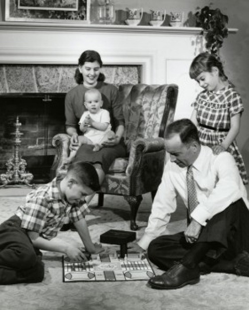 Parents and their children sitting in the living room Poster Print - Item # VARSAL2553177