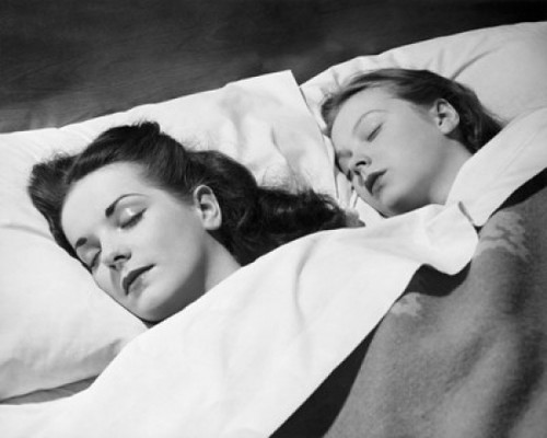 Mid adult woman sleeping with her daughter Poster Print - Item # VARSAL25521546 Mid adult woman sleeping with her daughter Poster Print - Item # VARSAL25521546