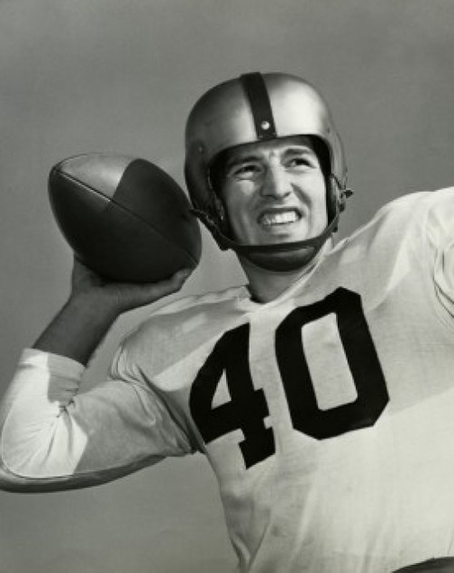 Close-up of a football player throwing a football Poster Print - Item # VARSAL2553654