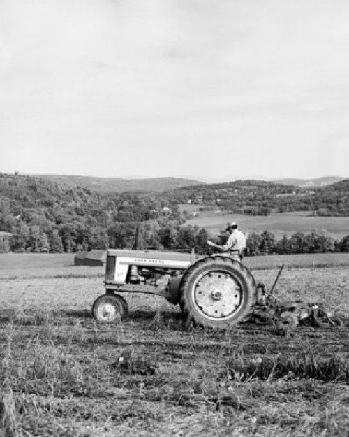 Side profile of a farmer plowing a field with a tractor  Quechee  Vermont  USA Poster Print - Item # VARSAL25530526