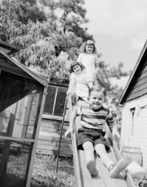 Children on slide Poster Print - Item # VARSAL255421617