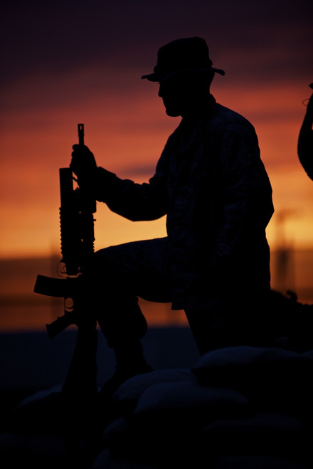 Silhouette of a U.S Marine on a bunker at sunset in Northern Afghanistan Poster Print - Item # VARPSTTMO100540M
