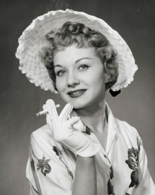 Portrait of a young woman smoking Poster Print - Item # VARSAL25515335