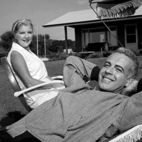 Mature couple relaxing in backyard Poster Print - Item # VARSAL25548889