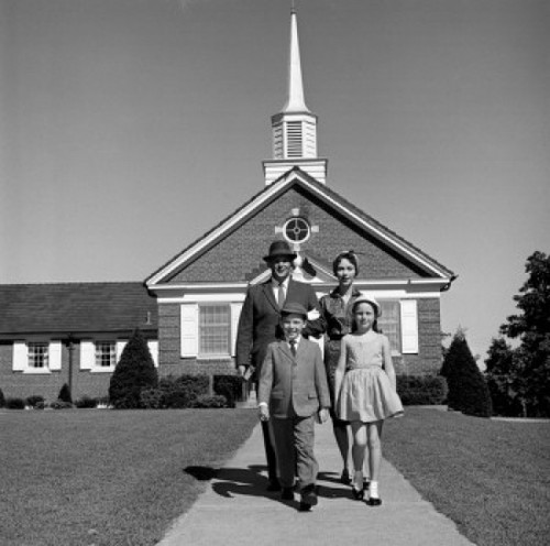 Parents and kids in front of church Poster Print - Item # VARSAL255417565