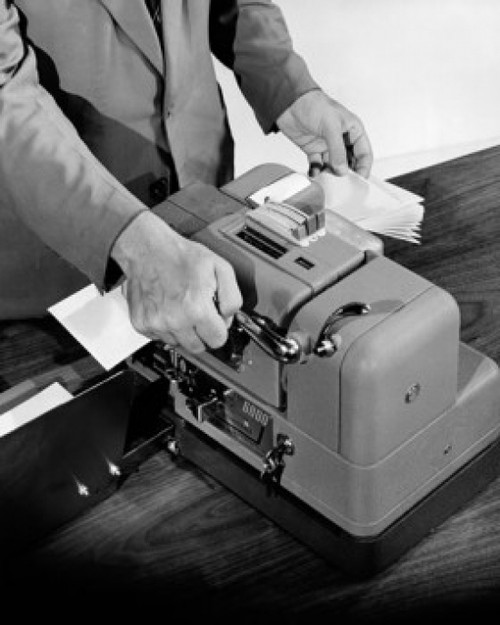 High angle view of a businessman using a lamination machine Poster Print - Item # VARSAL25548610