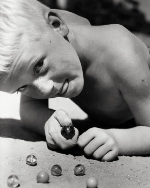Close-up of a boy playing marbles Poster Print - Item # VARSAL2553300