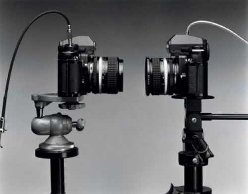 Close-up of two cameras Poster Print