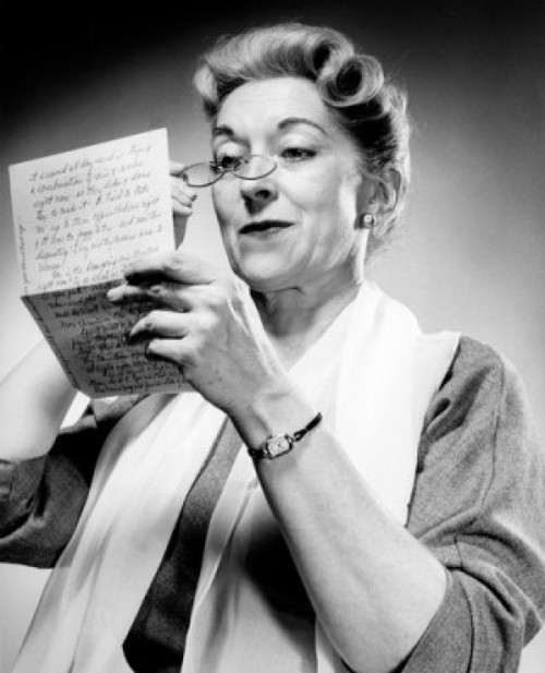 Studio shot of woman reading letter Poster Print - Item # VARSAL25548975