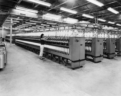 Side profile of a woman working in a textile factory Poster Print - Item # VARSAL25538428