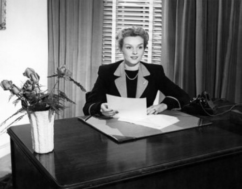 Businesswoman sitting in an office Poster Print - Item # VARSAL25548449B