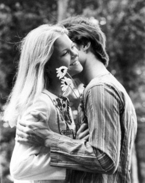 Young couple embracing in a park Poster Print - Item # VARSAL25526875