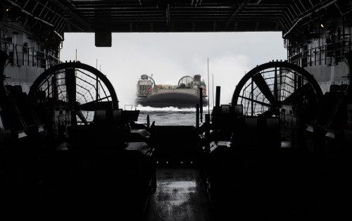 Atlantic Ocean, January 25, 2013 - Landing Craft Air Cushion approaches the well deck of the amphibious transport dock ship USS San Antonio Poster Print - Item # VARPSTSTK106746M