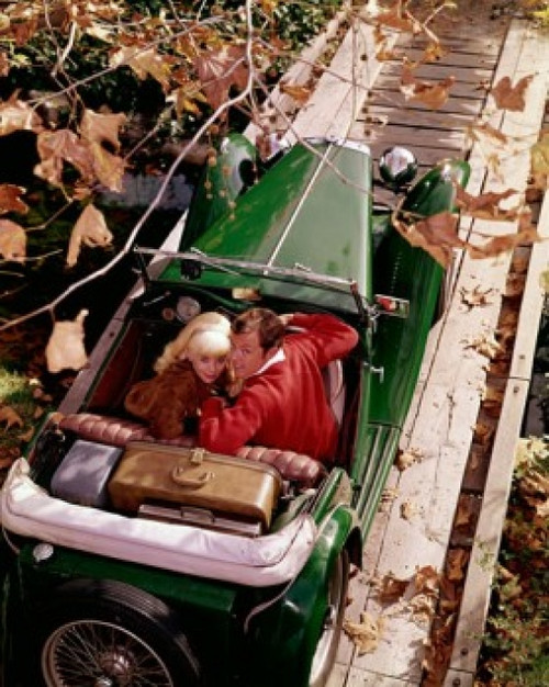 High angle view of a young couple sitting in a convertible car Poster Print - Item # VARSAL3811362408
