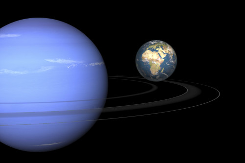 Artist' concept of Neptune and Earth. Neptune, a gas giant, is the planet furthest from the Sun. Neptune's diameter is four times that of the Earth's Poster Print - Item # VARPSTWMY100078S