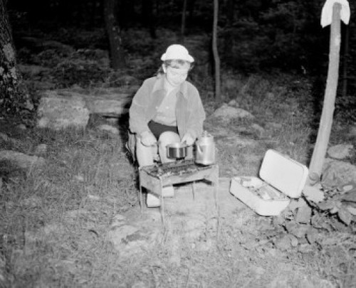 Young woman preparing food and drink on barbecue grill Poster Print - Item # VARSAL255422195