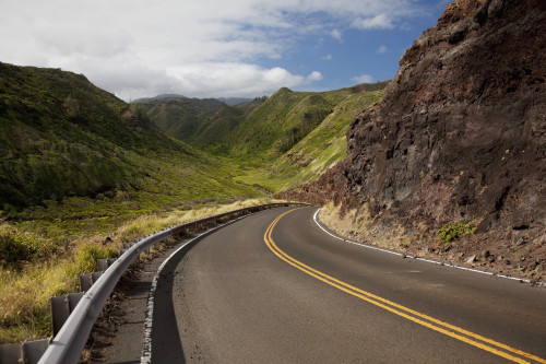 Hawaii, Maui, A winding road through Maui's west side with lush mountains. PosterPrint - Item # VARDPI2116671