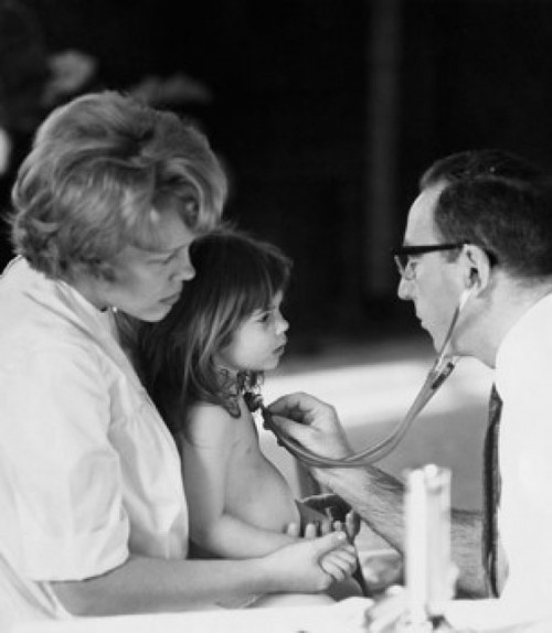 Male pediatrician examining a girl with a stethoscope Poster Print - Item # VARSAL25515218