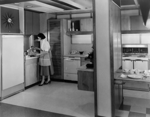 Side profile of a young woman working in the kitchen Poster Print - Item # VARSAL25531916