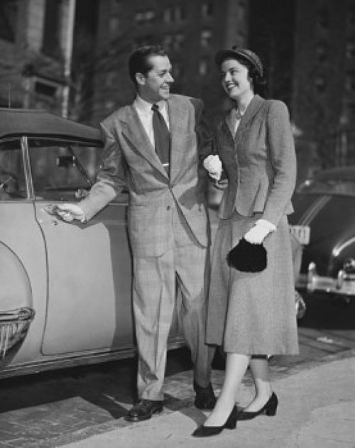 Young couple standing near car Poster Print - Item # VARSAL2552986