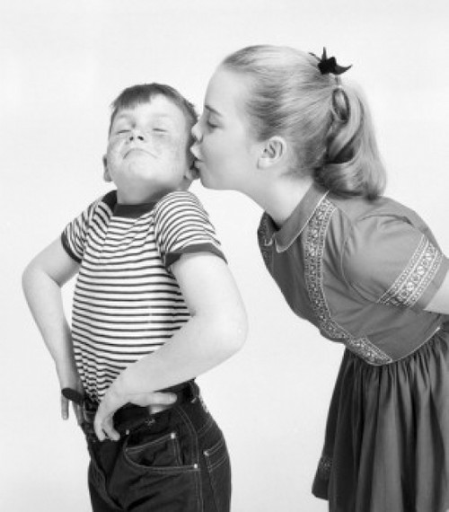 Studio shot of girl kissing boy Poster Print - Item # VARSAL2553615 Studio shot of girl kissing boy Poster Print - Item # VARSAL2553615