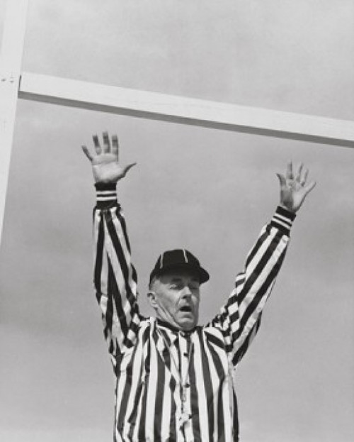 Low angle view of a football referee signaling a touchdown Poster Print - Item # VARSAL2553676B