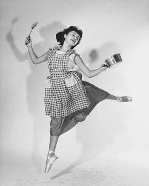 Young woman holding kitchen utensils and dancing Poster Print - Item # VARSAL25514616