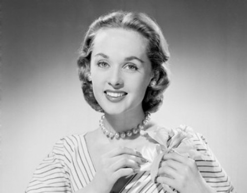 Portrait of a young woman smiling Poster Print - Item # VARSAL25510965