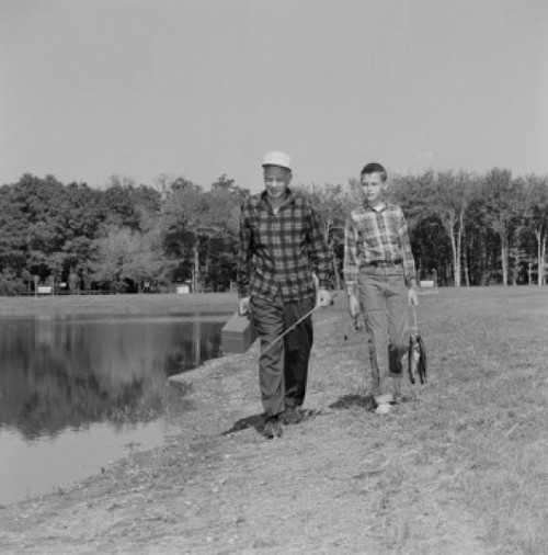 USA  Father and son with fish and fishing equipment Poster Print - Item # VARSAL255424808