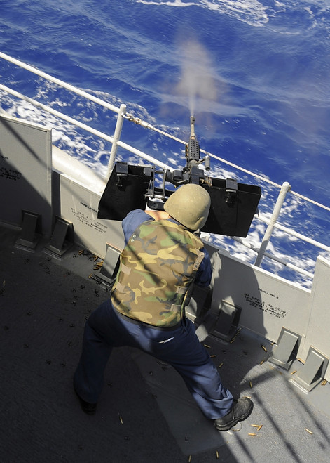 Mediterranean Sea, September 15, 2008 - Gunners Mate fires a .50 caliber machine gun during a live fire exercise aboard the guided-missile cruiser USS Vella Gulf Poster Print - Item # VARPSTSTK103127M