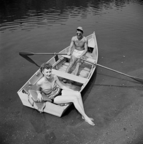 Elevated view of man and woman in fishing boat Poster Print - Item # VARSAL255423026 Elevated view of man and woman in fishing boat Poster Print - Item # VARSAL255423026