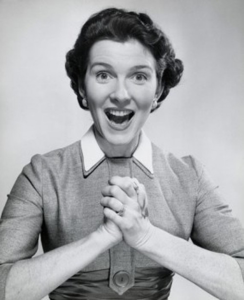 Portrait of a mid adult woman looking surprised with her hands clasped Poster Print - Item # VARSAL25511553