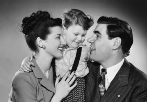 Portrait of happy family with small boy Poster Print - Item # VARSAL255419635