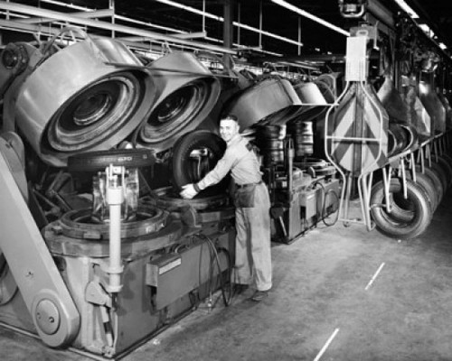 Portrait of a male worker working in a tire factory Poster Print - Item # VARSAL25537978