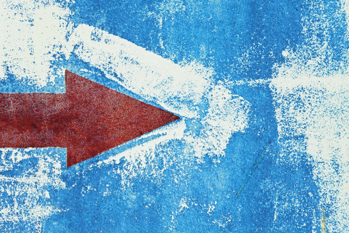 Red Arrow Painted On Blue Wall PosterPrint - Item # VARDPI1843678